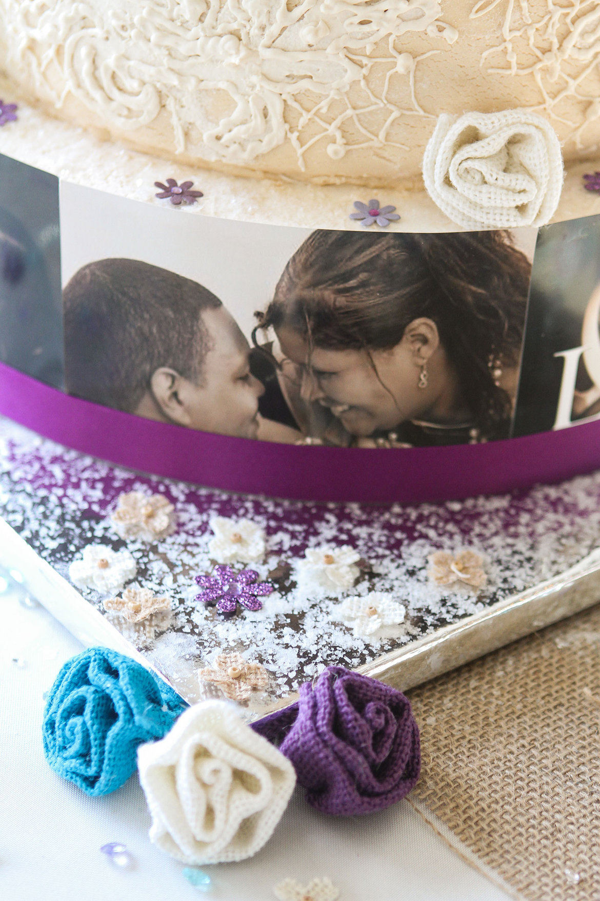 wedding cake decorated with engagement photos