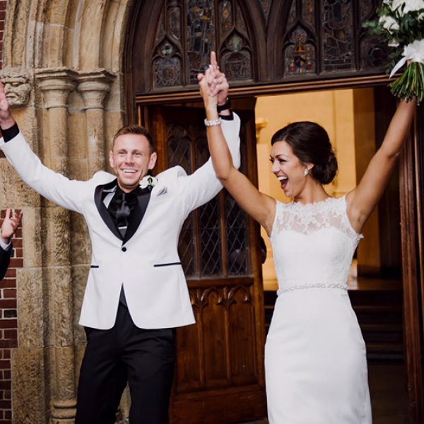 couple leaving church after wedding ceremony